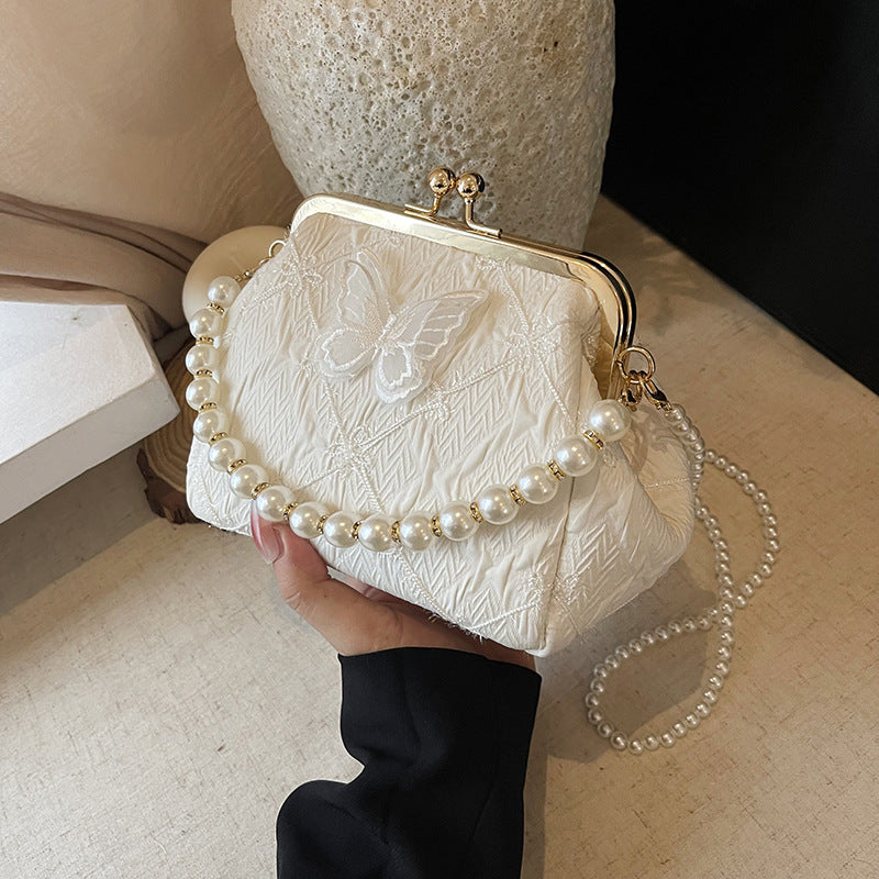 Foreign trade new Chinese embroidery small bag women's 2025 summer new fashion pearl chain mouth gold bag versatile messenger bag
