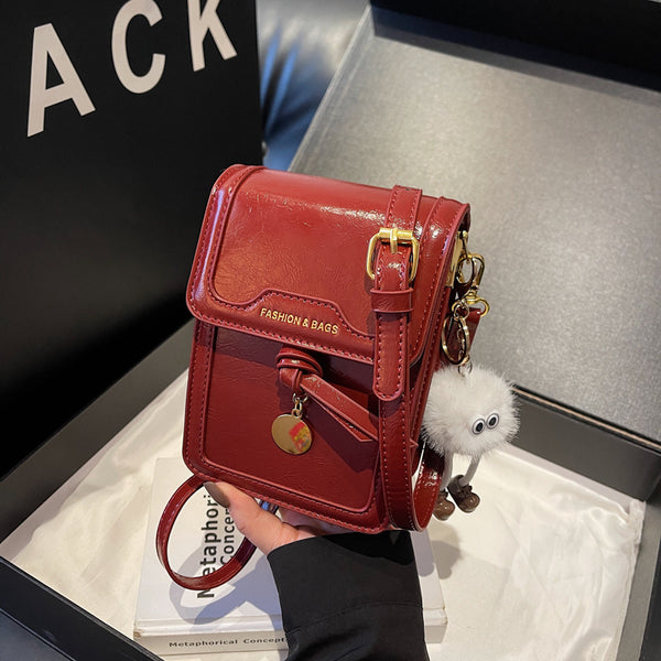 New Year's mobile phone bag messenger girl 2025 new fashion design sense niche shoulder bag high value small bag