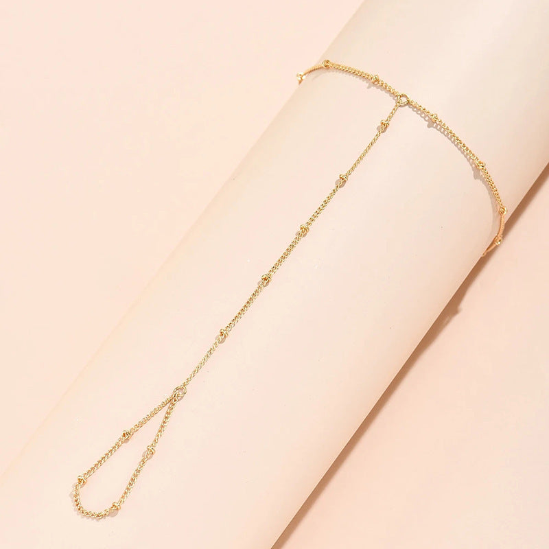 European and american new arrival versatile jewelry: minimalist white pearl bracelet, women's butterfly finger chain bracelet - wholesale from manufacturer