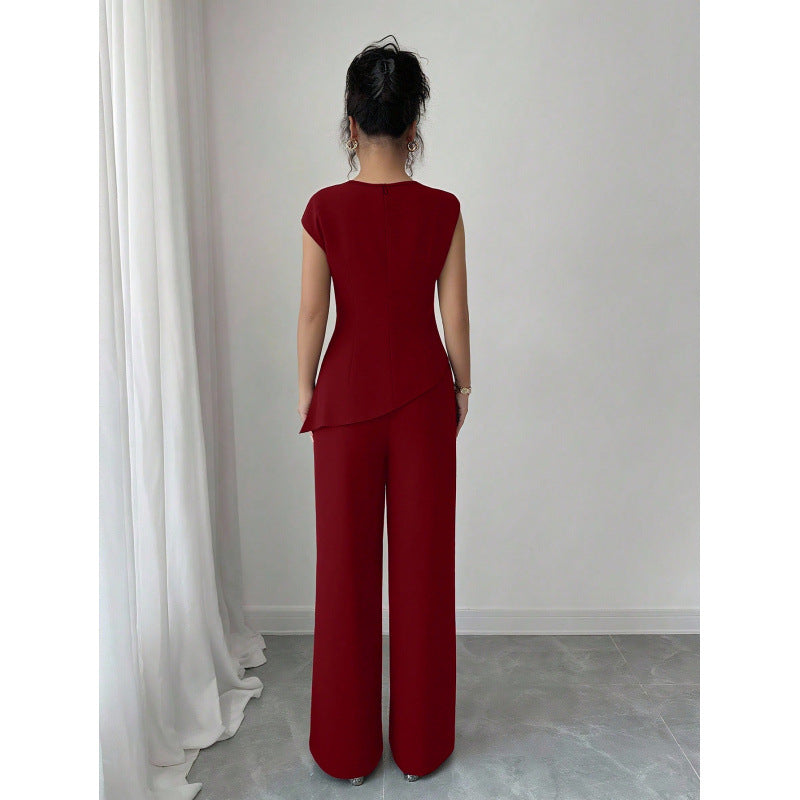Women's elegant sleeveless fitted top with metal accents and asymmetrical hem, paired with loose straight-leg pants - 2-piece set