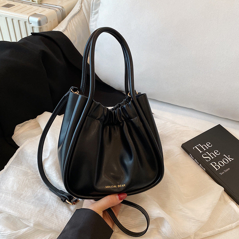 Foreign order high-quality texture foreign gas bucket bag women's 2025 summer new fashion commuter shoulder portable messenger bag