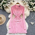 French retro chic: high-end, fashionable, notched collar, long sleeve, metal buckle, cinched waist, slimming, elegant knit dress