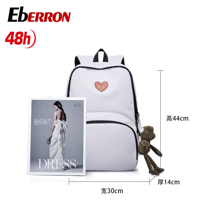 New simple and versatile schoolbag, high-value dirt-resistant belt, doll large-capacity backpack, male and female middle school student backpack.