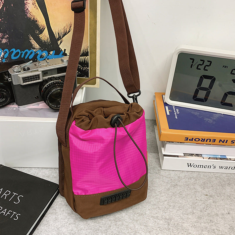 Foreign trade cute contrasting color draw belt small bag women 2025 new versatile sports and leisure shoulder messenger bag cloth bag