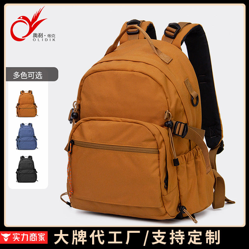 Backpack wholesale custom casual Korean version solid color simple college student schoolbag large capacity multi-function lightweight backpack