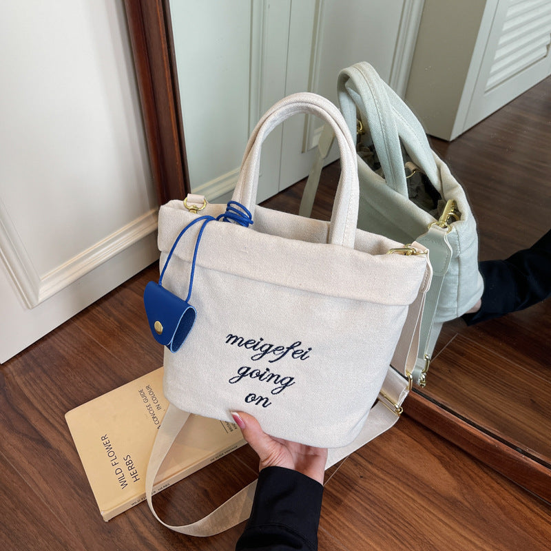 Cross-border alphabet canvas bag women's 2025 new trendy summer fashion bucket bag high-end large-capacity shoulder bag
