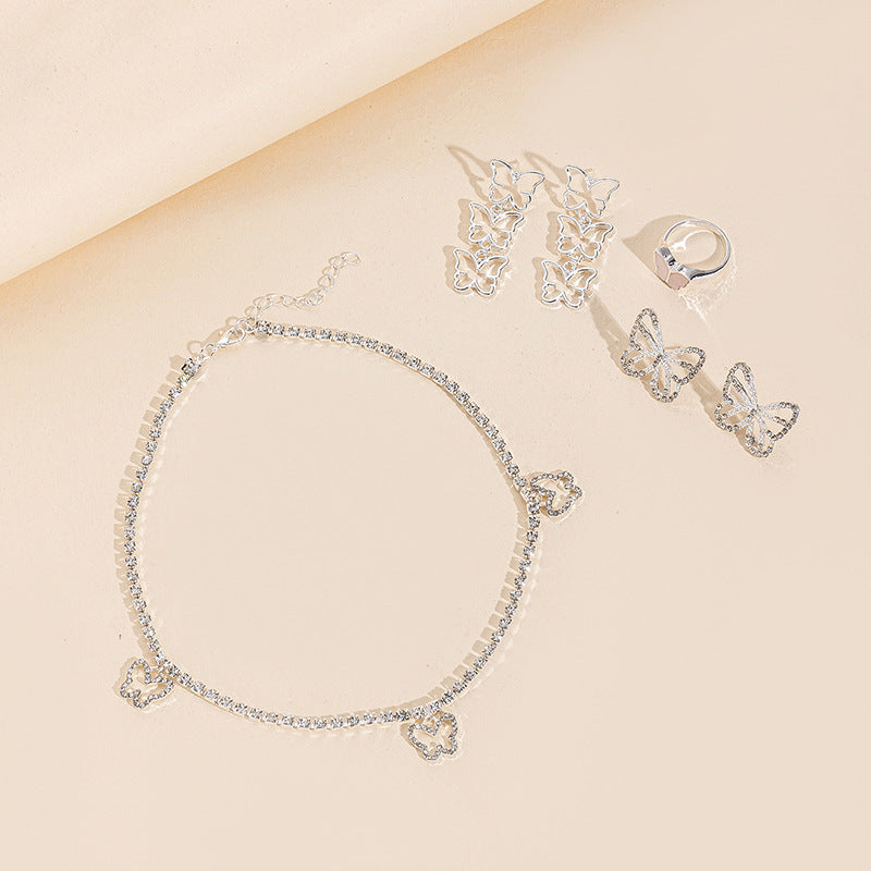 Wholesale butterfly earrings: european & american cross-border fashion jewelry for women - diamond-accented, versatile, unique alloy earrings with a sophisticated, niche appeal