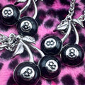 Wholesale necklace accessories: european & american cross-border jewelry - minimalist black cherry & billiard ball pendants, skull necklaces