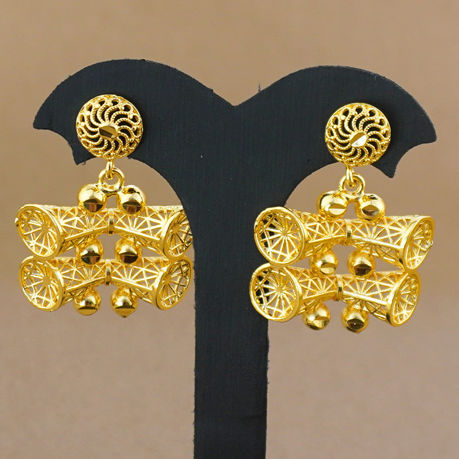 Middle eastern exaggerated four-piece tie set with african-inspired earrings, rings, bracelets, and necklaces for bridal weddings