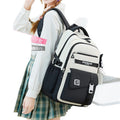 2025 schoolbag junior high school girls water-repellent nylon oxford cloth ultra-light spine-protecting backpack junior high school schoolbag