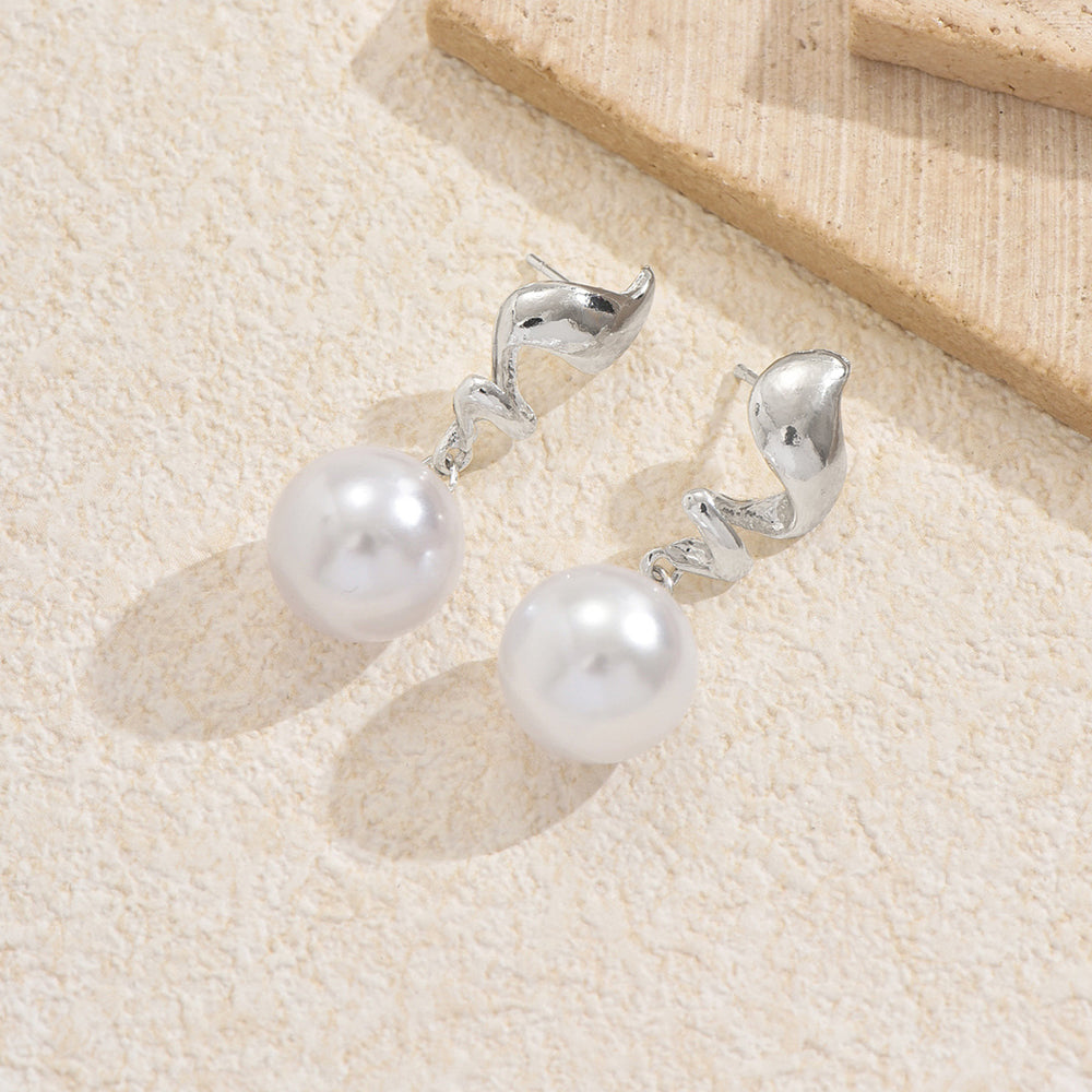 European and american cross-border creative pearl stud earrings: high-end geometric spiral flame, unique and elegant vintage earrings for women