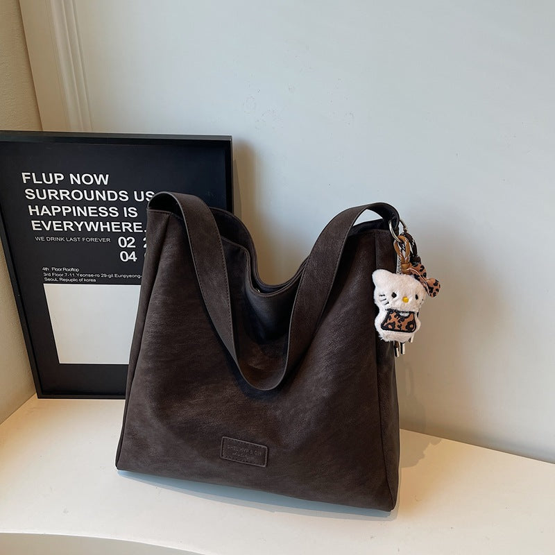 Large capacity retro handbag for women, trendy 2025 new arrival, minimalist versatile soft shoulder bag, high-end commuter tote bag
