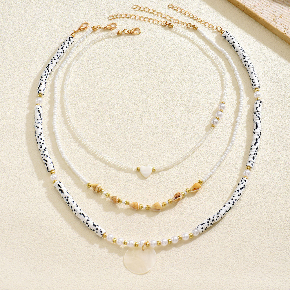 Wholesale seashell beaded necklaces - european & american style, cross-border e-commerce, sweater accessories for women, layered necklaces, unique heart & pearl clavicle chains