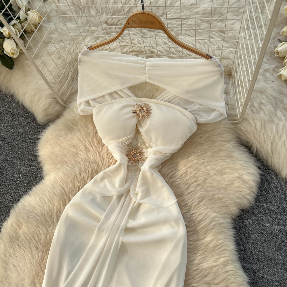 Luxury chic women's french-style one-shoulder bandeau dress with metal buckle, cinched waist, and flowing ribbon mesh detail