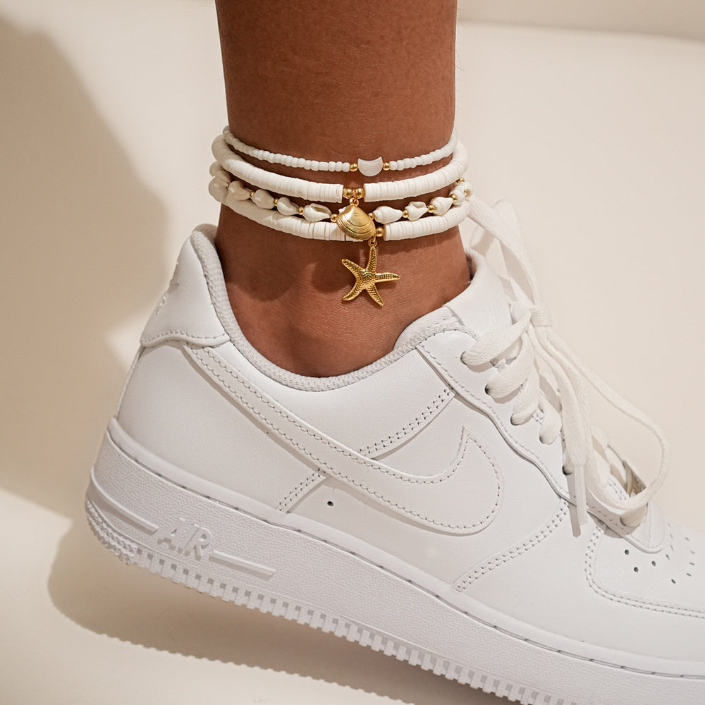 Fashion cross-border vacation style four-piece set shell anklet fashioncasual stacked multi-layered rice beads starfish braided anklet