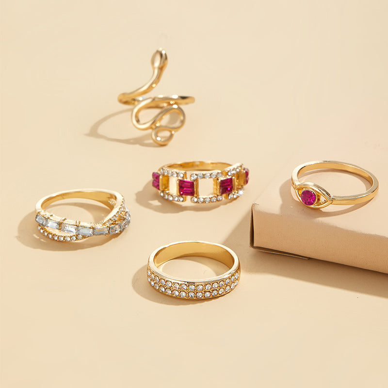 Wholesale alloy rings: european & american cross-border, niche, high-end jewelry - diamond-accented snake ring set, stackable women's accessories