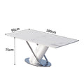 Direct from the factory: customizable, small-space, modern minimalist dining table with a luxurious rock slab top and stainless steel frame