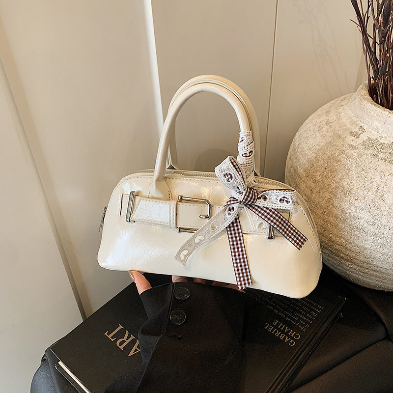 Dopamine girl hand shell bag 2025 spring and summer new Korean version shoulder bag fashion niche casual shoulder bag