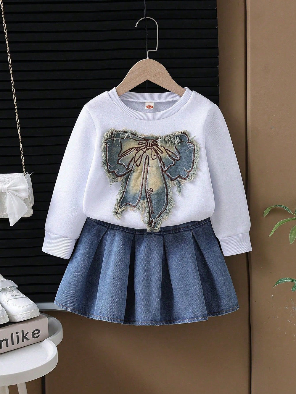 cross-border new arrival: girls' spring/autumn denim bowknot sweatshirt + heavy-duty washed denim skirt two-piece set