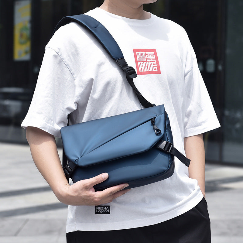 Cross-border new men's large-capacity casual bag, outdoor sports fashion leather film, shoulder messenger bag, one piece will be sent on behalf of others.