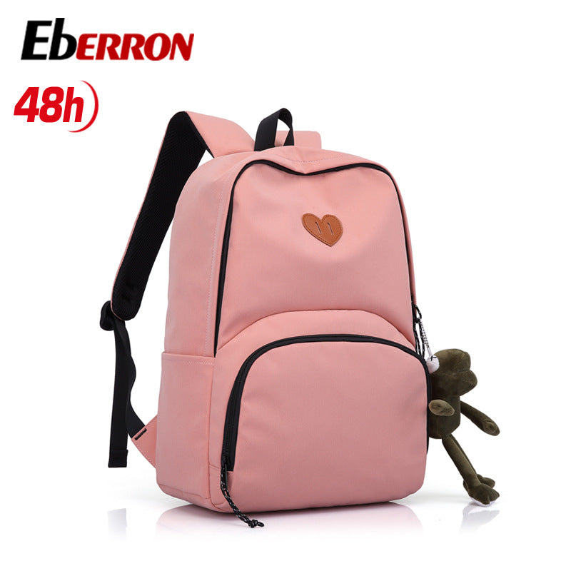 New simple and versatile schoolbag, high-value dirt-resistant belt, doll large-capacity backpack, male and female middle school student backpack.