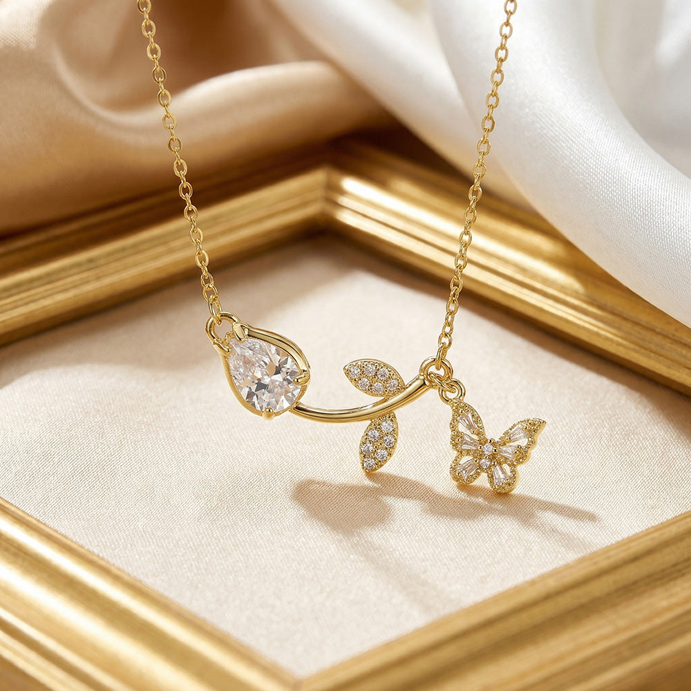 Popular and versatile copper-inlaid zirconium full-diamond tulip butterfly necklace for women, accessible luxury niche elegant clavicle chain jewelry