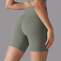 Naked-feel, high-waisted, butt-lifting yoga shorts – perfect for running, fitness, and a custom-made, three-quarter length fit. sampling and oem manufacturing available