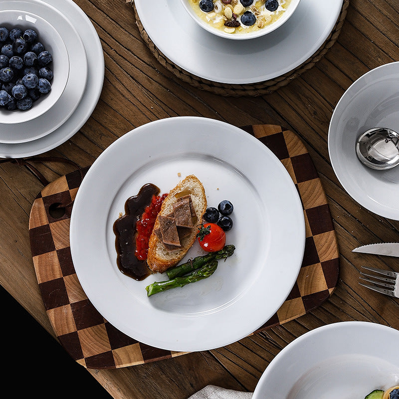 Minimalist pure white ceramic dinnerware set - ideal for restaurants, hotels, and home use. includes plates, rice bowls, soup bowls, and fruit/salad plating dishes