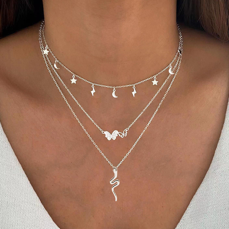Wholesale snake chain layered pendants - european & american cross-border jewelry - high-end women's butterfly, star, and moon necklaces - multi-layered necklaces