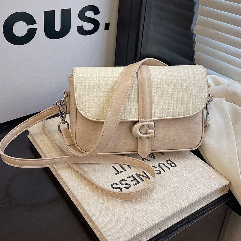 Fashion bag women's new Korean version of casual commuting simple shoulder bag high sense versatile foreign style portable messenger bag