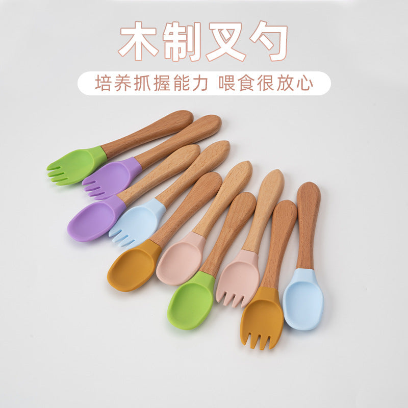 Factory direct sales silicone wooden handle complementary food fork and spoon  baby spoon baby training eating fork and spoon set wholesale