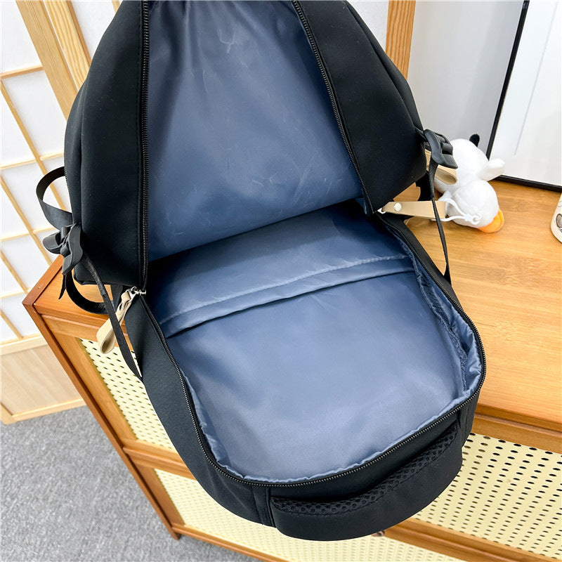 Cross-border wholesale large-capacity leisure backpack versatile burden reduction schoolbag outdoor handbag portable high school backpack
