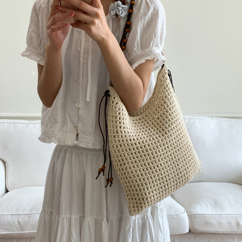 Cross-border niche design mesh bag hollow woven tote bag shoulder messenger bag 2025 new leisure style beach bag