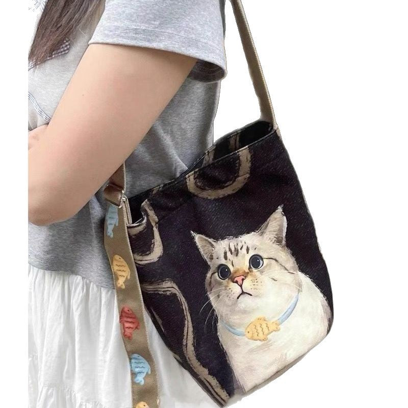 2025 korean-inspired canvas tote bag: large capacity, effortless style, canvas cat design, unique and trendy shoulder/crossbody bag
