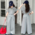 Girls' new korean style summer two-piece set: trendy, versatile, and chic - featuring irregular design and casual wide-leg pants