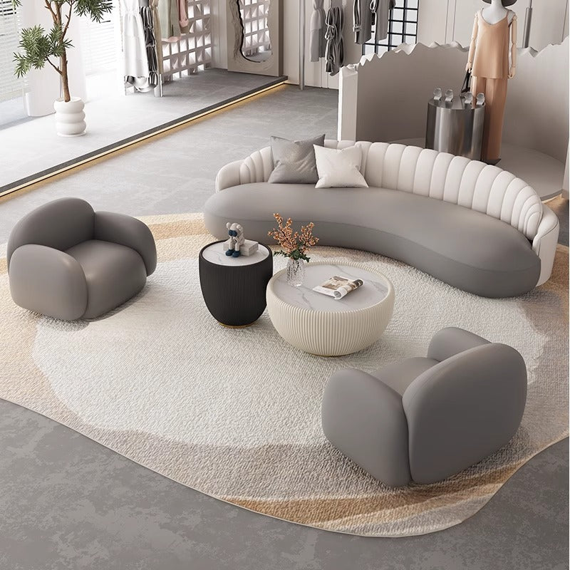 Luxury office reception area lounge hotel lobby front desk minimalist modern curved leather sofa
