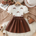 girls' autumn new arrival: bubble sleeve bow texture top + pu leather a-line skirt two-piece set