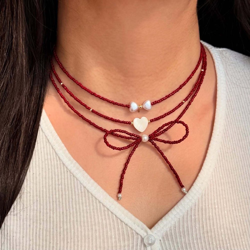 European and american cross-border red beaded bow necklace - luxury, unique design, stackable heart pearl jewelry necklace