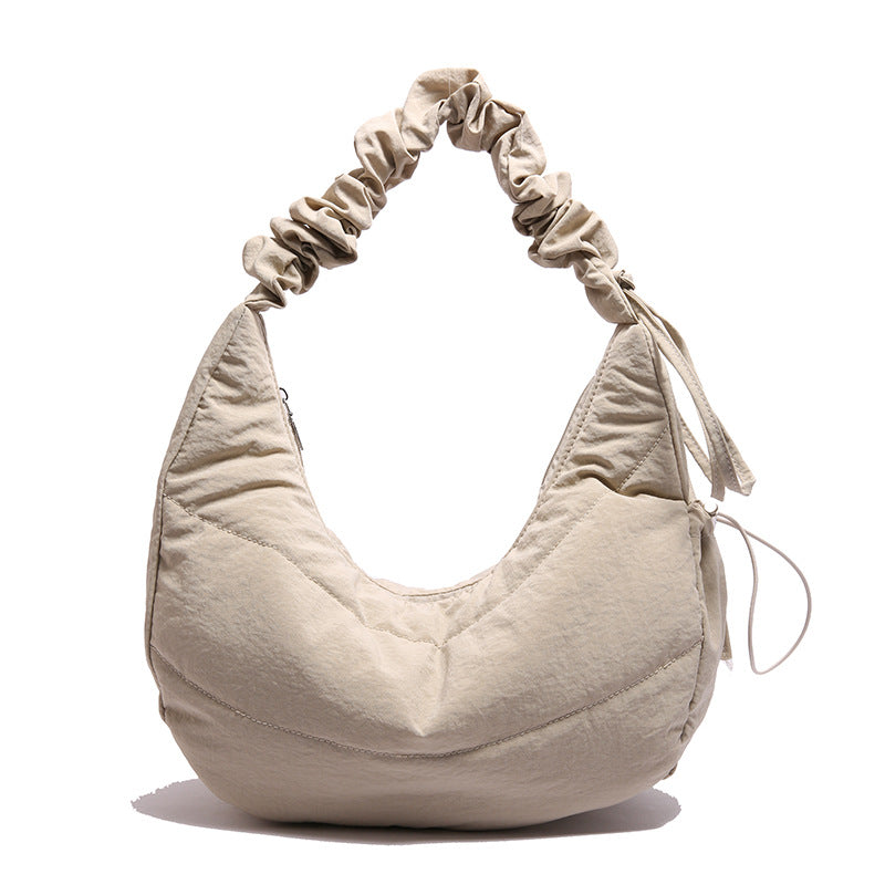 Fashion bag women's 2025 new college style dumpling bag casual large capacity shoulder messenger bag