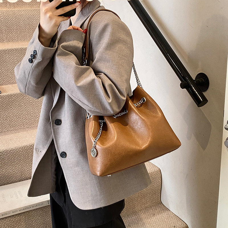 Soft leather handbag 2025 new women's bag simple retro small leather bag fashion cosmetic bag solid color chain diagonal backpack