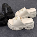 Thick sole rivet slippers women's summer outwear thick sole stomping on shit feeling 2025 new summer popular sandals wholesale