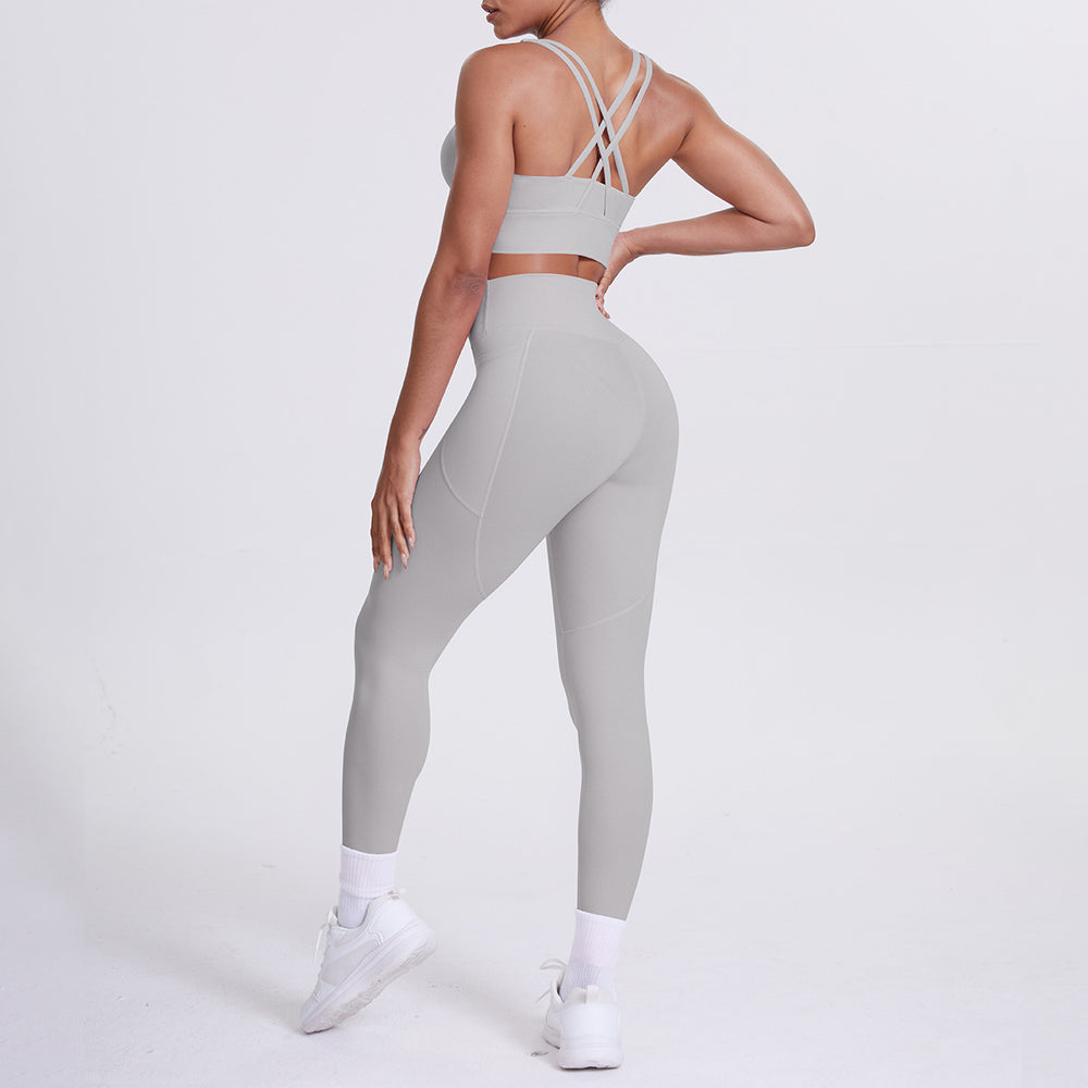 Fashion cross-border nude brushed cross back bra sports hip pocket pants fitness yoga clothes two-piece set