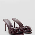 Mng mango women's chocolate brown patent leather heeled sandals with floral detail