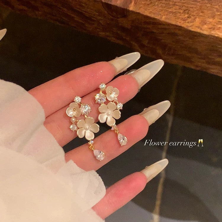 French-style cubic zirconia flower tassel earrings - women's luxury, high-end, and exquisite stud earrings. ethereal, trendy, and chic