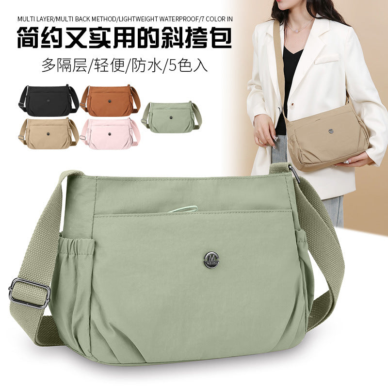 Simple new solid color shoulder bag women's light casual versatile outdoor small square bag fashionable commuter pleated messenger bag
