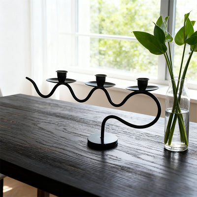 European retro minimalist wavy iron candle holder with electronic candles for a romantic ambiance in living room or dining table