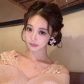 Pink bowknot dangle earrings - luxury, elegant, and exquisite for the modern woman