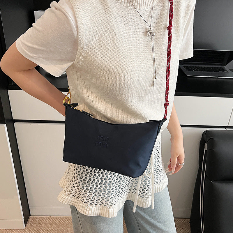 Internet celebrity trend shoulder bag 2025 summer new contrasting color canvas small lunch box bag commuter fashion trend handbag