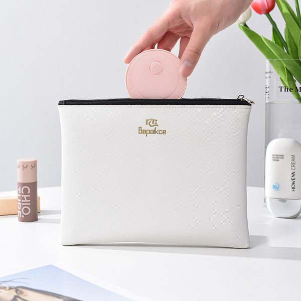 Cosmetic bag Large capacity high value cosmetic bag Women portable going out Cosmetics storage bag High sense hand wallet