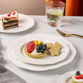 European-style pure white dessert plate, three-tier fruit platter, modern showroom display, creative embossed ceramic plate wholesale